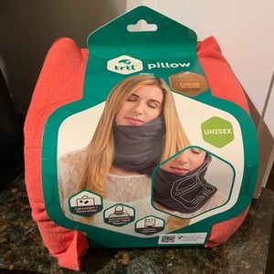 New Trtl travel pillow in coral - the best travel pillow for neck suppor…